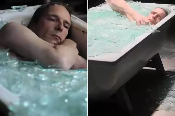 unbelievable Naked Artist Lies In Bath Full Of Broken Glass. [Photos]